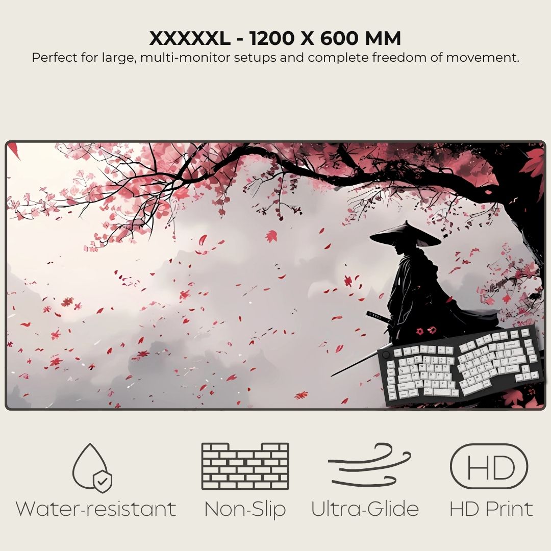 XXXXXL mouse pad with cherry blossom design and a samurai silhouette.