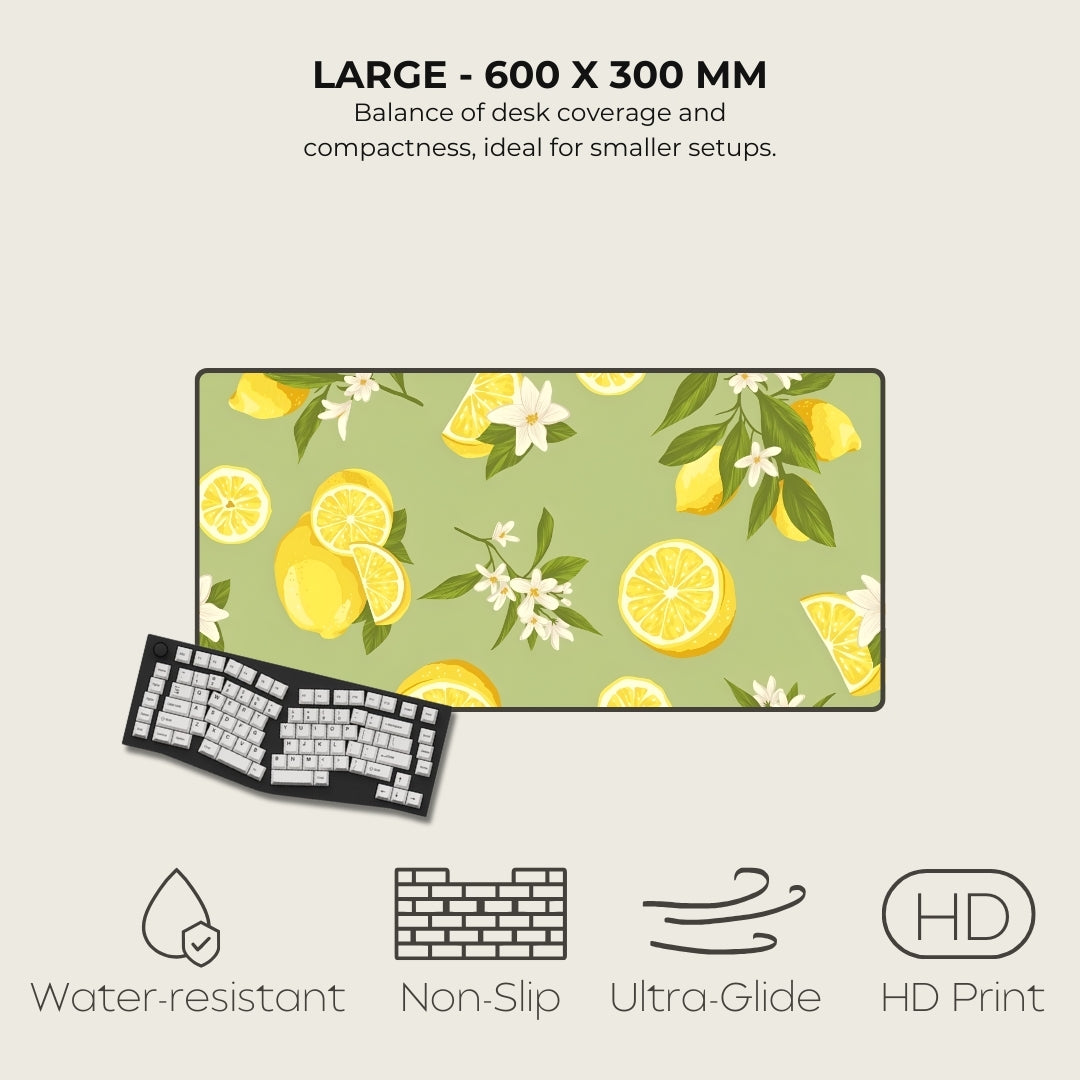 Desk mat with lemon design and keyboard on a light gray background