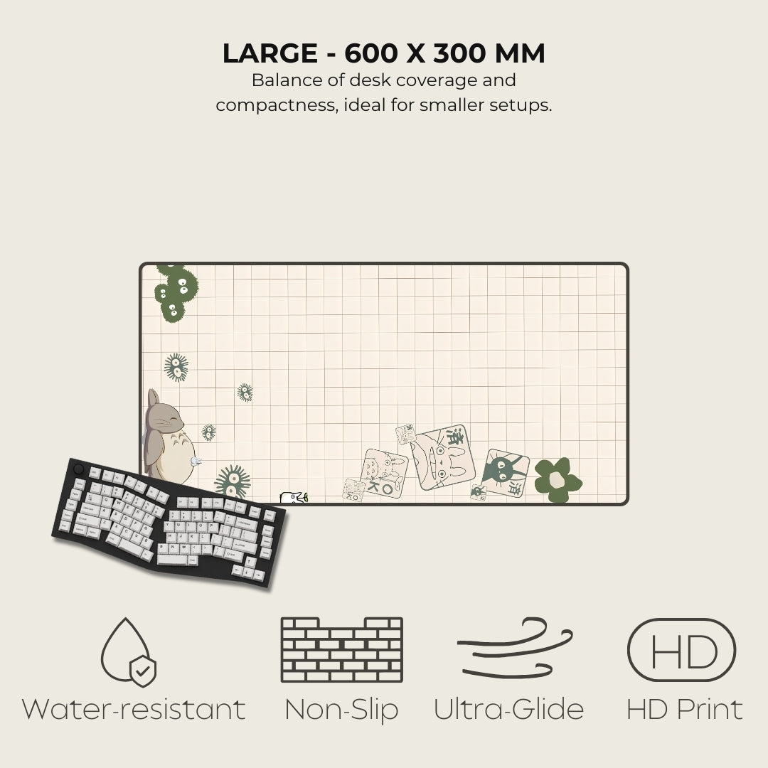 Large desk mat with cartoon designs and text on a light gray background