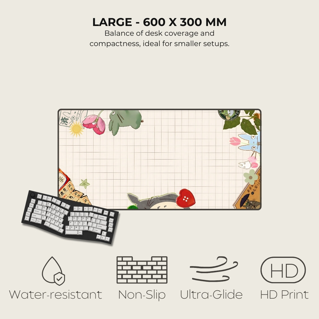 Large desk mat with cartoon design and text detailing size, features, and benefits on a light gray background.