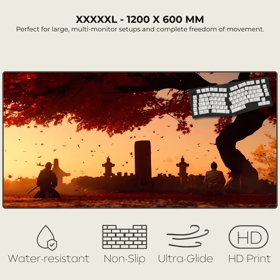 XXXXXL desk mat with scenic design of people sitting under a tree, featuring a keyboard on a sunset background.