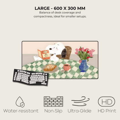 Desk mat with a cartoon dog, flowers, and food items on a checkered tablecloth, with product features listed below.