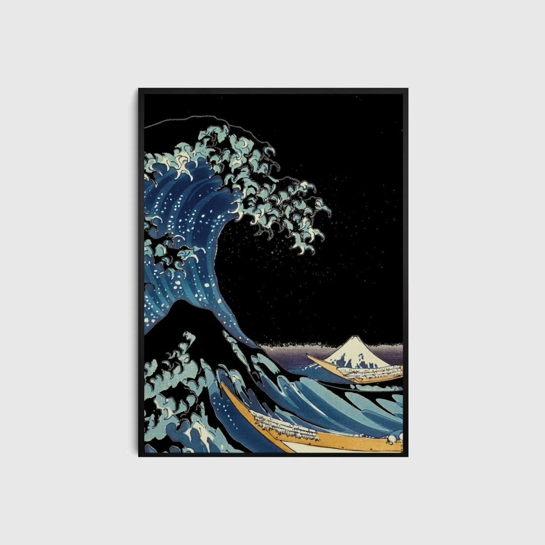 Framed artwork of a wave and mountain landscape on a light gray background