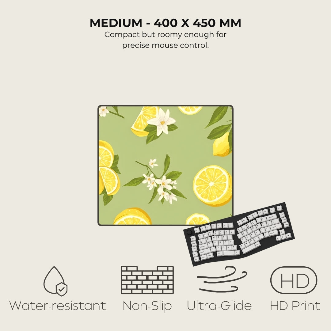 Floral and lemon patterned mouse pad with keyboard on a light gray background