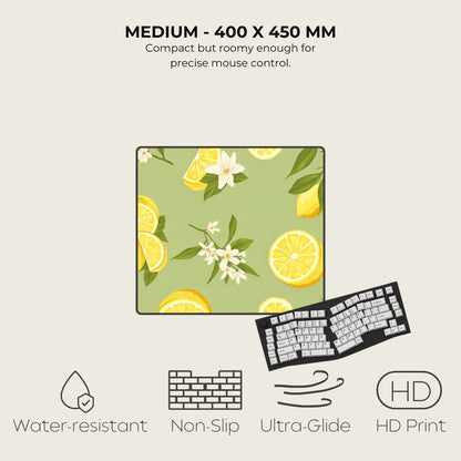Floral and lemon patterned mouse pad with keyboard on a light gray background