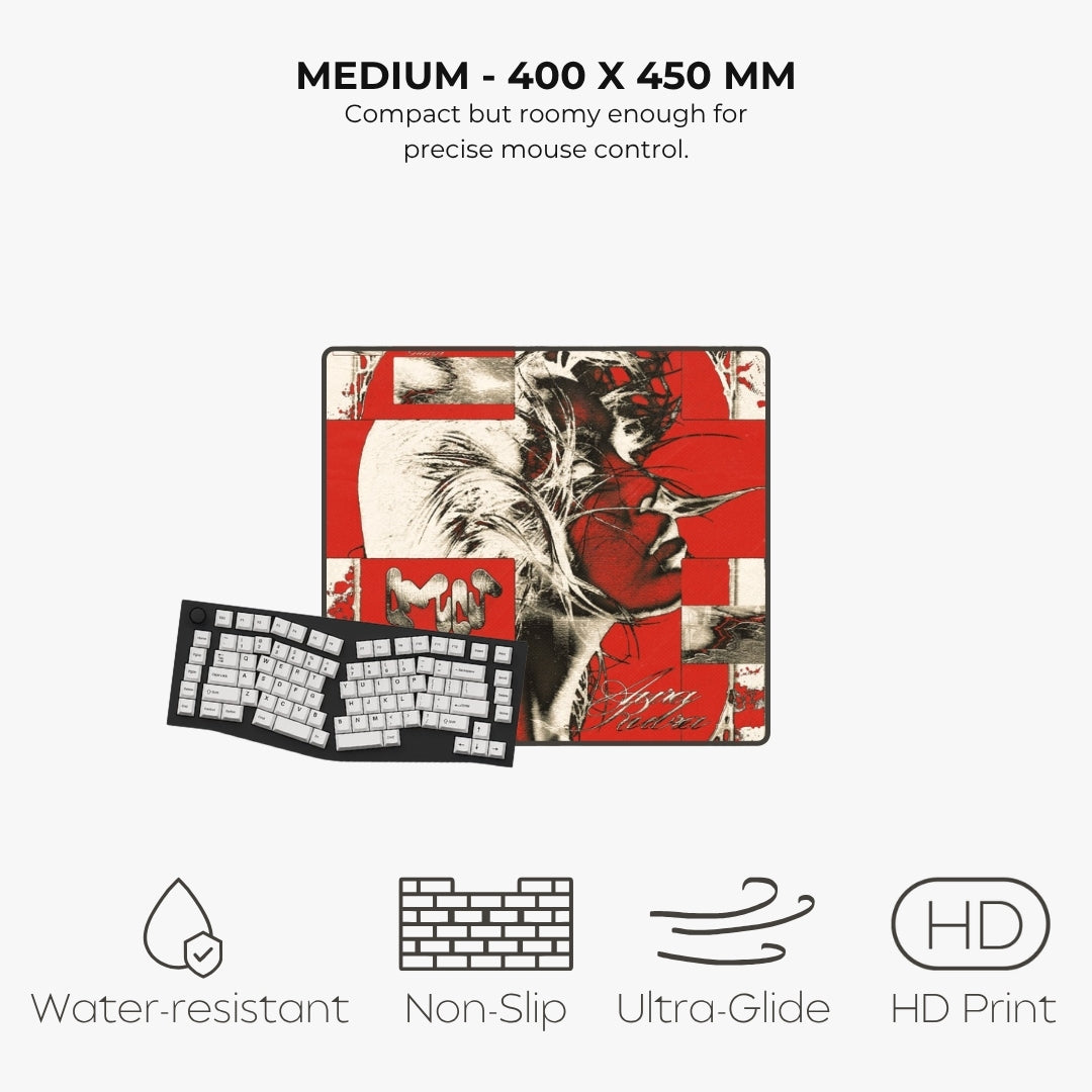 A mouse pad with a red, black, and white collage-style graphic featuring a woman's profile and keyboard keycaps, shown with a keyboard underneath on a light gray background. Text above reads 'MEDIUM - 400 X 450 MM' and below feature icons for water-resistant, non-slip, ultra-glide, and HD print.