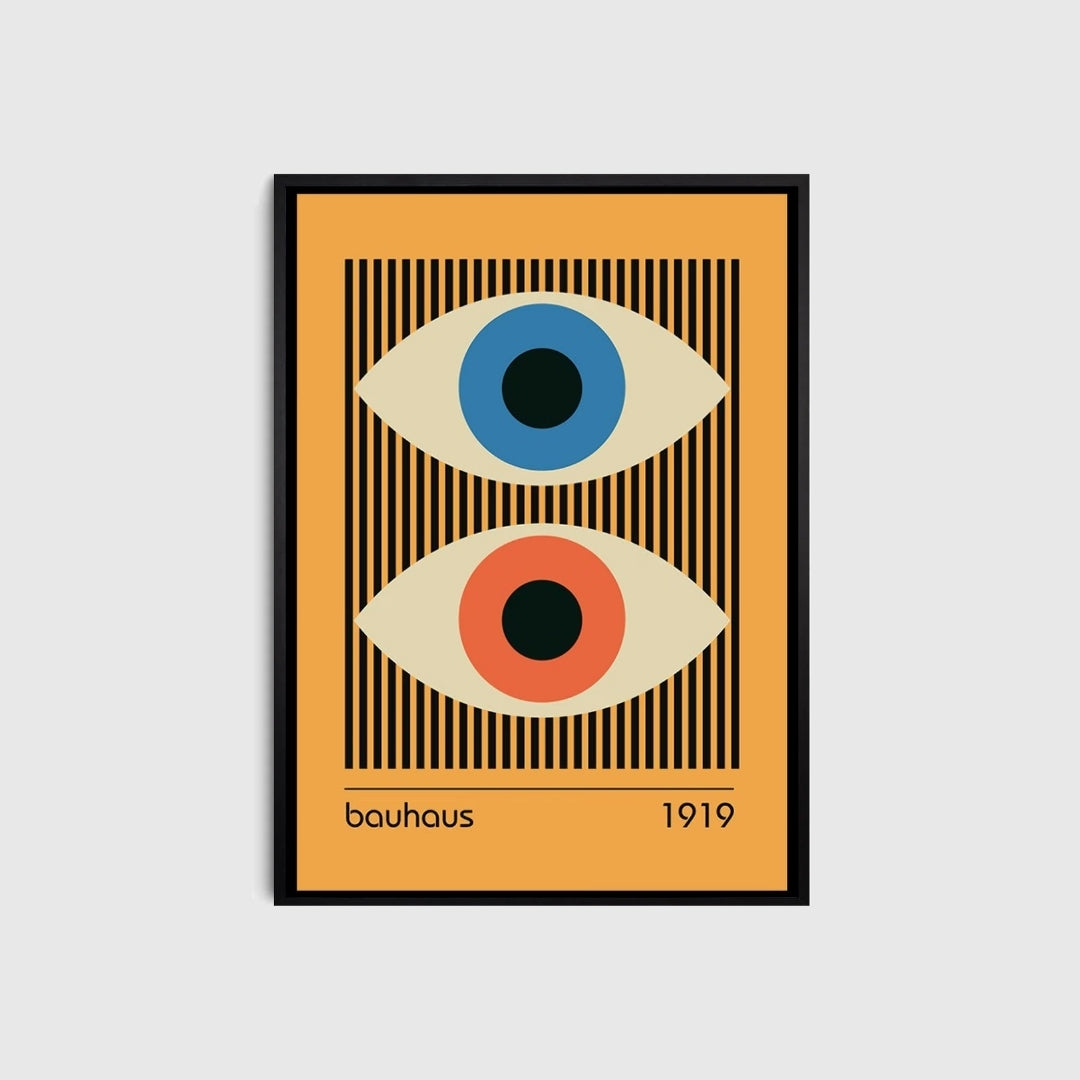 Framed artwork with abstract eyes design on a yellow background