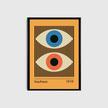 Framed artwork with abstract eyes design on a yellow background