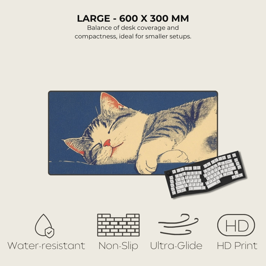 Large desk mat with a cat design, featuring text on size and features.