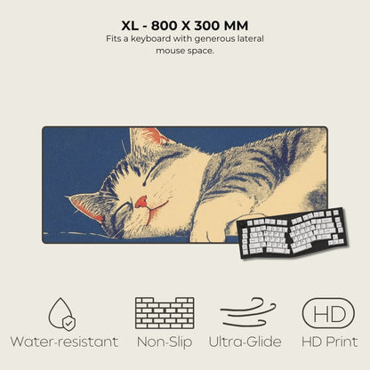 Large mouse pad with a cat design and keyboard on a beige background