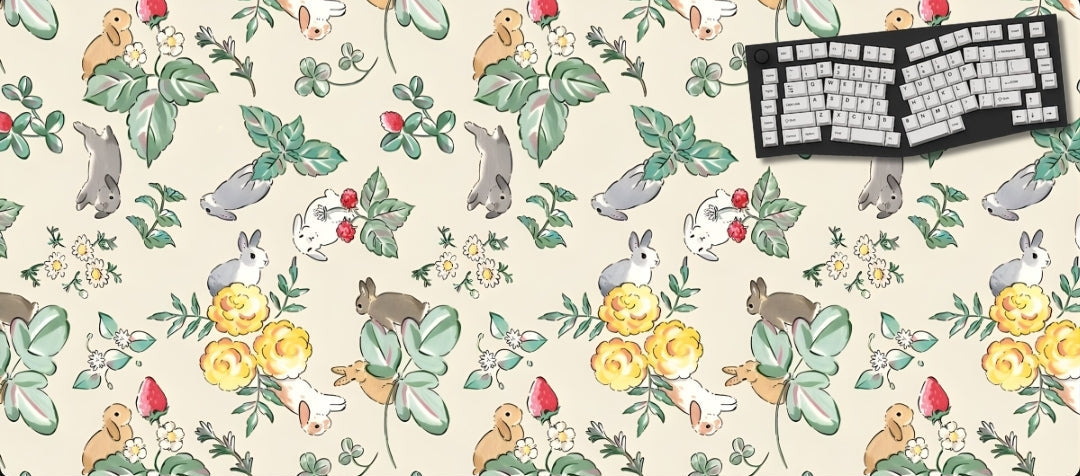 Desk mat with animal and floral pattern featuring a keyboard on a white background