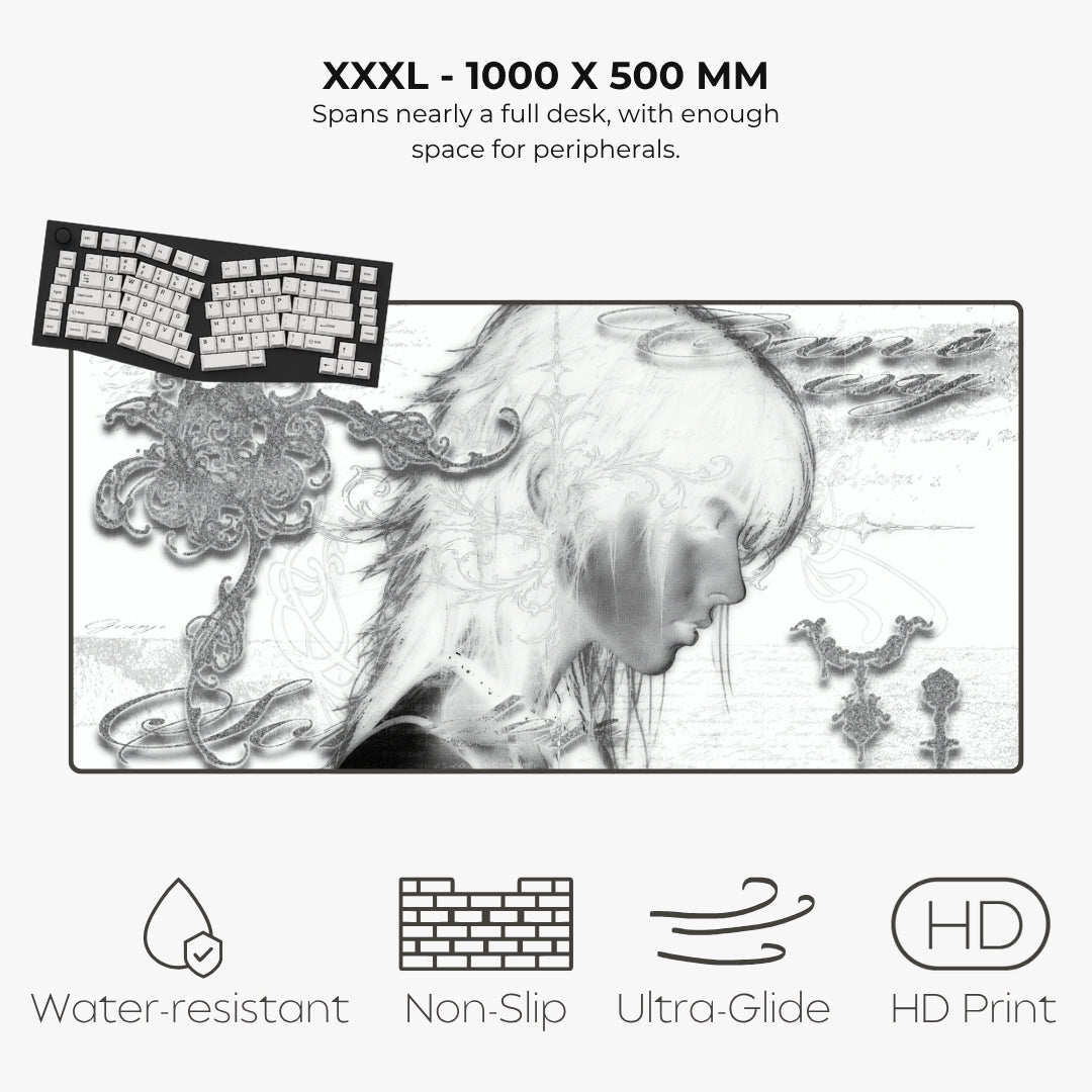 A large desk mat or mouse pad shown on a light gray background with text reading 'XXXL - 1000 X 500 MM' and feature icons for water resistance, non-slip, ultra-glide, and HD print. The mat has a monochrome artistic illustration of a woman's profile with ornate decorative details.