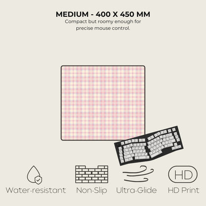 Pink checkered mouse pad with text and icons on a light gray background