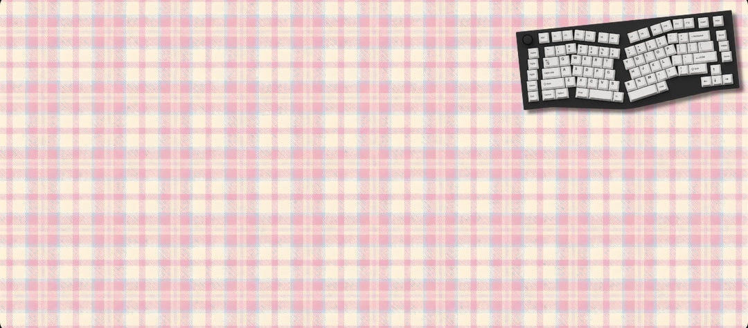 Keyboard-style mouse pad with a checkered pattern on a black background