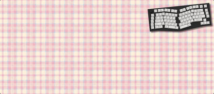 Keyboard-style mouse pad with a checkered pattern on a black background