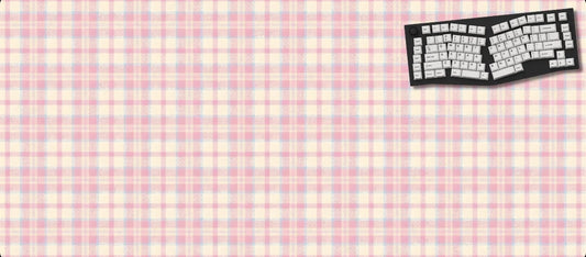 Keyboard-style mouse pad with a checkered pattern on a black background