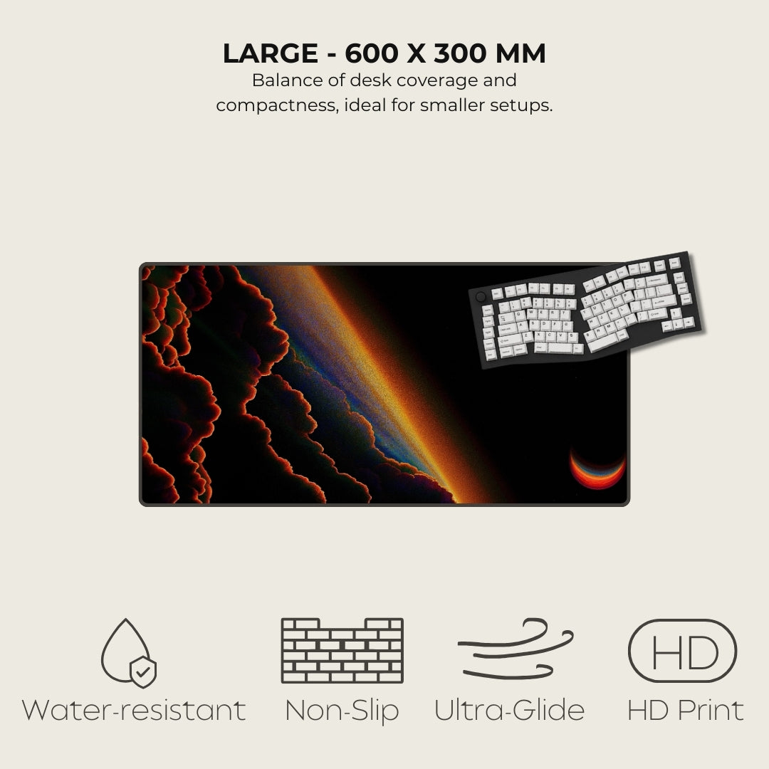 Large desk mat with a space-themed design, keyboard, and text about size and features.