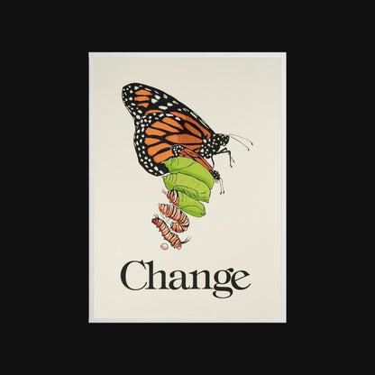Framed artwork of a butterfly and caterpillar with 'Change' text on against a black wall.