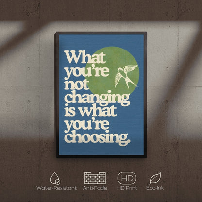 Framed motivational poster with quote on a textured wall