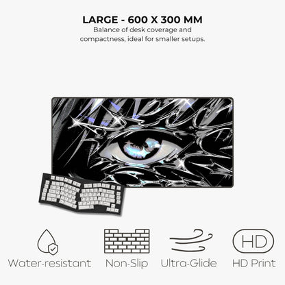 A large rectangular gaming desk mat with a black and white cracked-glass design featuring a detailed blue eye in the center, shown alongside a keyboard. Text above reads 'LARGE - 600 X 300 MM' and below feature icons for water-resistant, non-slip, ultra-glide, and HD print.