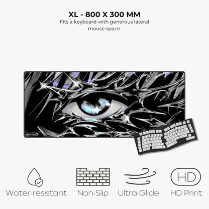 A large rectangular gaming mouse pad with a black, white, and gray abstract eye design, shown with a keyboard on a light gray background. Text above reads 'XL - 800 X 300 MM' and text below lists features: water-resistant, non-slip, ultra-glide, and HD print.