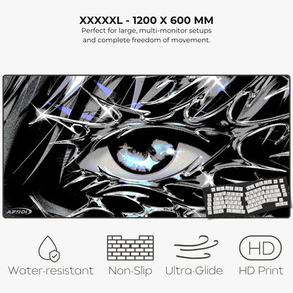 A large gaming desk mat with a black and white anime-style graphic mousepad featuring a prominent eye and keyboard illustration. The image includes text at the top reading 'XXXXXL - 1200 X 600 MM' and feature icons at the bottom for Water-resistant, Non-Slip, Ultra-Glide, and HD Print.