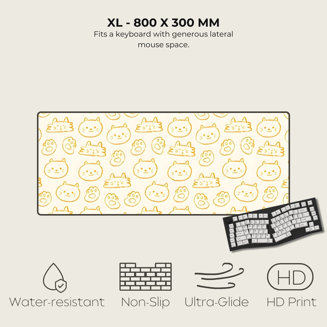 Large mouse pad with cat pattern, keyboard on the side, and feature icons below.