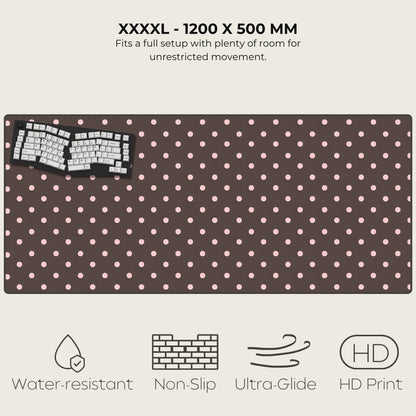 Large desk mat with pink polka dots and keyboard illustration, featuring product dimensions and features.