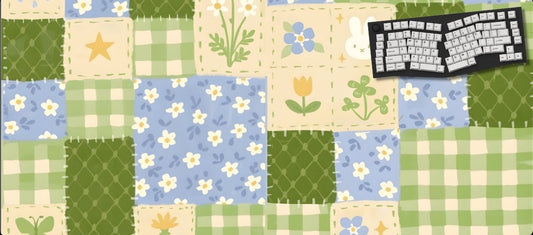 Patchwork-style mat with floral and geometric patterns on a black background