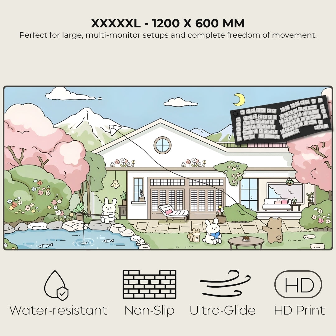 Large desk mat with cartoon house and furniture design, featuring a keyboard on a scenic background.