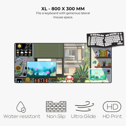 An XL desk mat featuring a colorful cartoon-style room scene with a computer setup, plants, books, and characters, shown with text highlighting its 900 x 400 mm size and features like water resistance, non-slip, ultra-glide, and HD print.