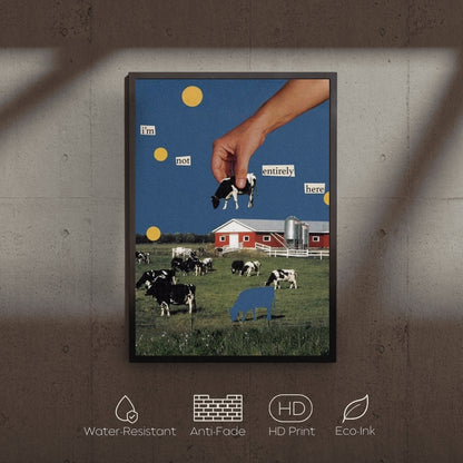 Framed artwork of a hand holding a cow over a farm scene with text on a concrete wall.