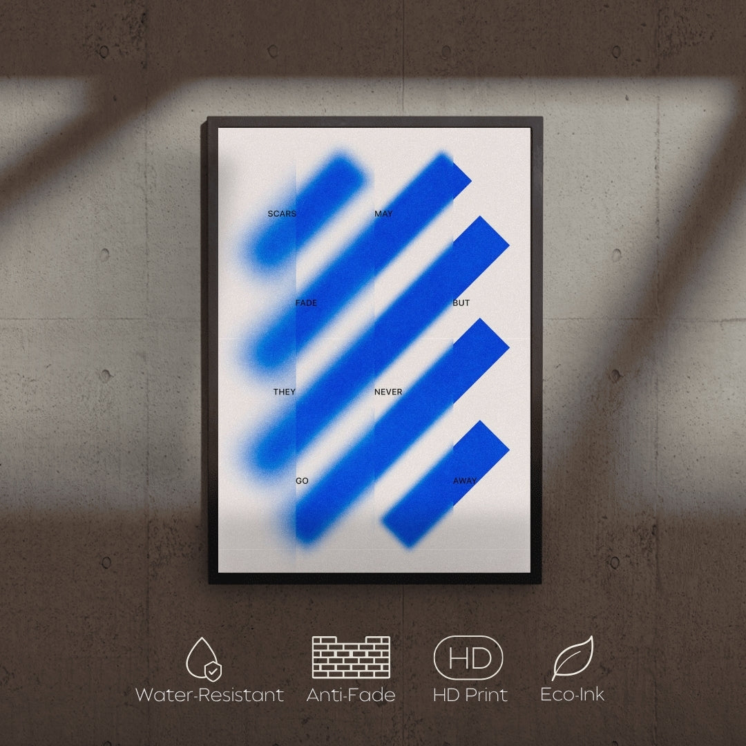 Framed artwork with blue abstract design on a textured wall