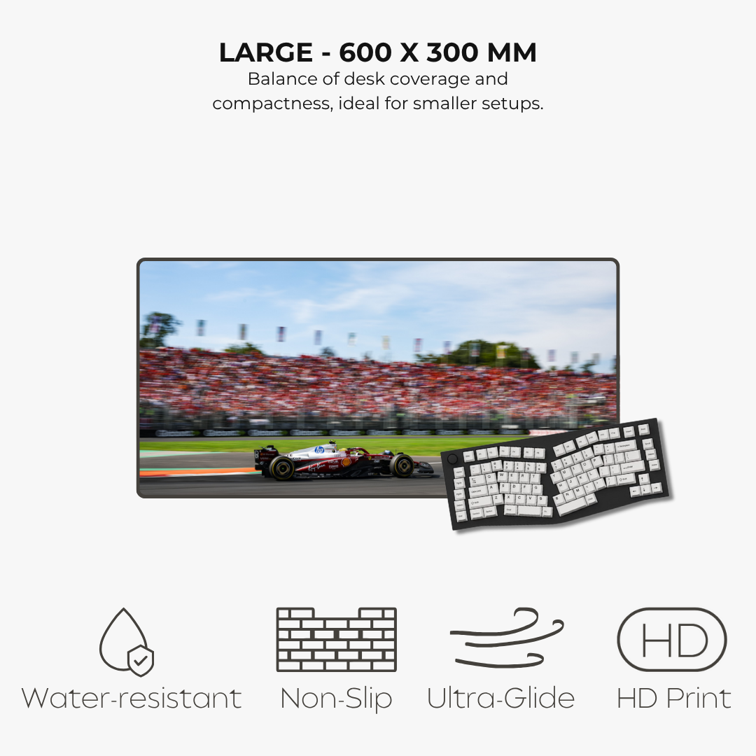 Large mousepad with f1 racing game display, keyboard, and text about product features on a white background.