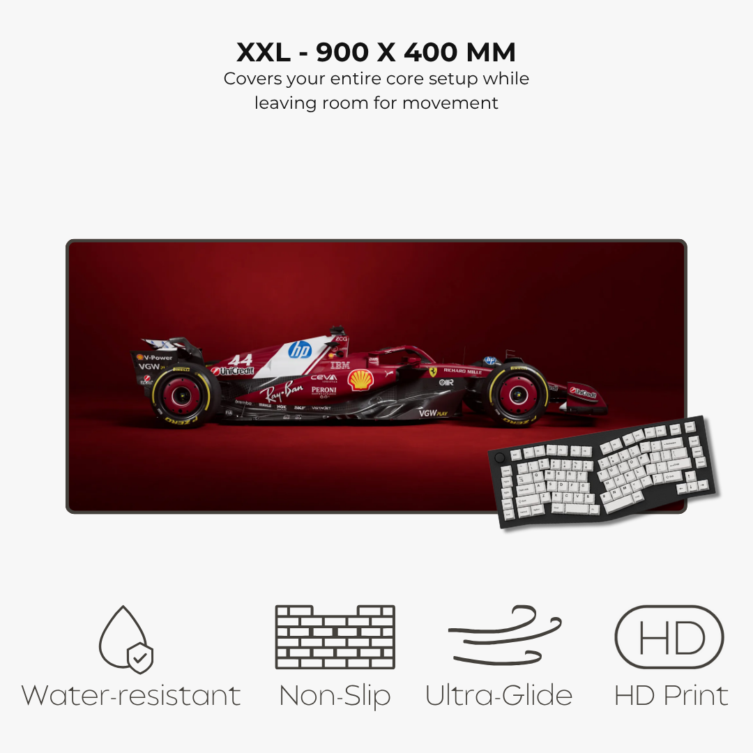 Red racing car and keyboard on a large red mouse pad with specifications and features listed.