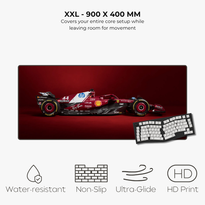 Red racing car and keyboard on a large red mouse pad with specifications and features listed.