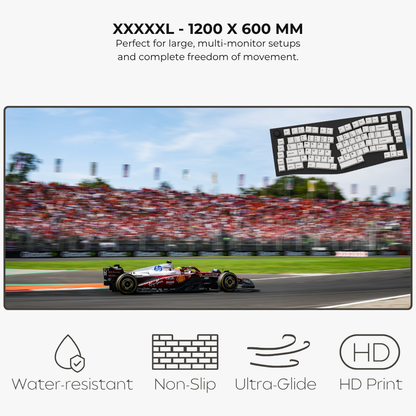 Large monitor displaying a racing car on a track with keyboard overlay, featuring text about screen size and features.