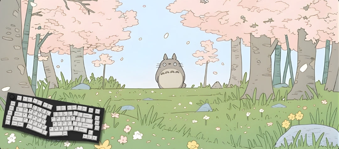 Keyboard with a cartoon character in a cherry blossom garden