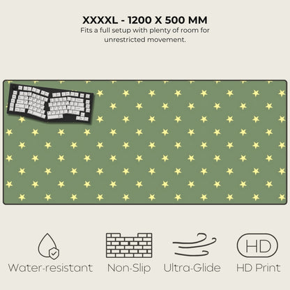 Green mouse pad with yellow star pattern and keyboard on a white background