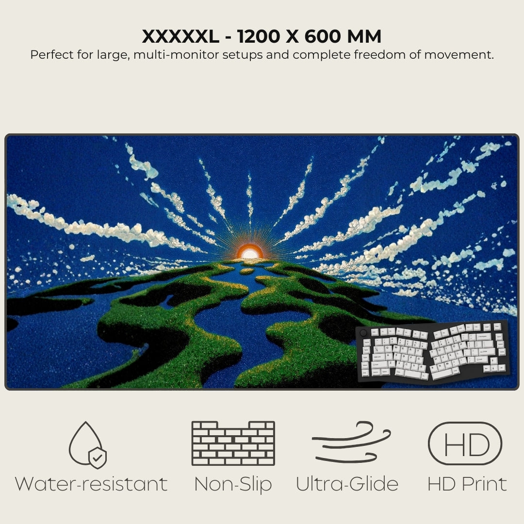 Large desk mat with a design of a sun rising over a landscape and a keyboard, featuring text about size and properties.