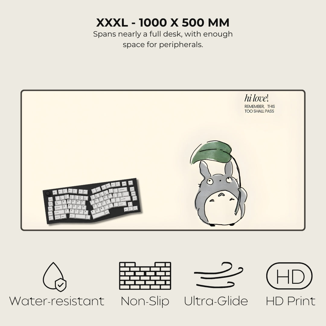 Large desk mat with a cartoon character and text, featuring dimensions and product features.