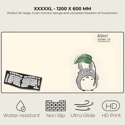 Large mouse pad with cartoon character, keyboard, and product features on a light background