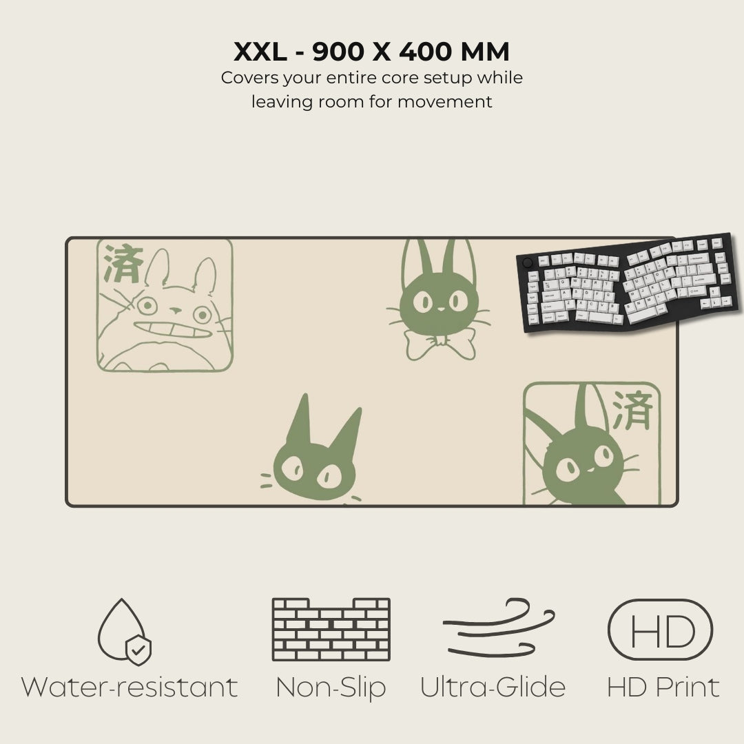 Large gaming mouse pad with cartoon cat designs and product features listed.