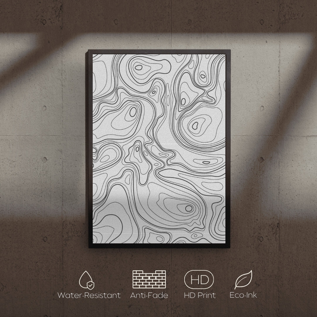 Framed topographic map art on a textured wall with feature icons below.