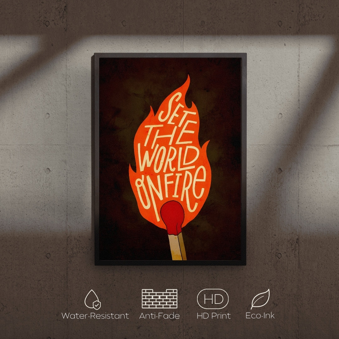 Framed artwork with a match and 'Set the World on Fire' text on a dark background