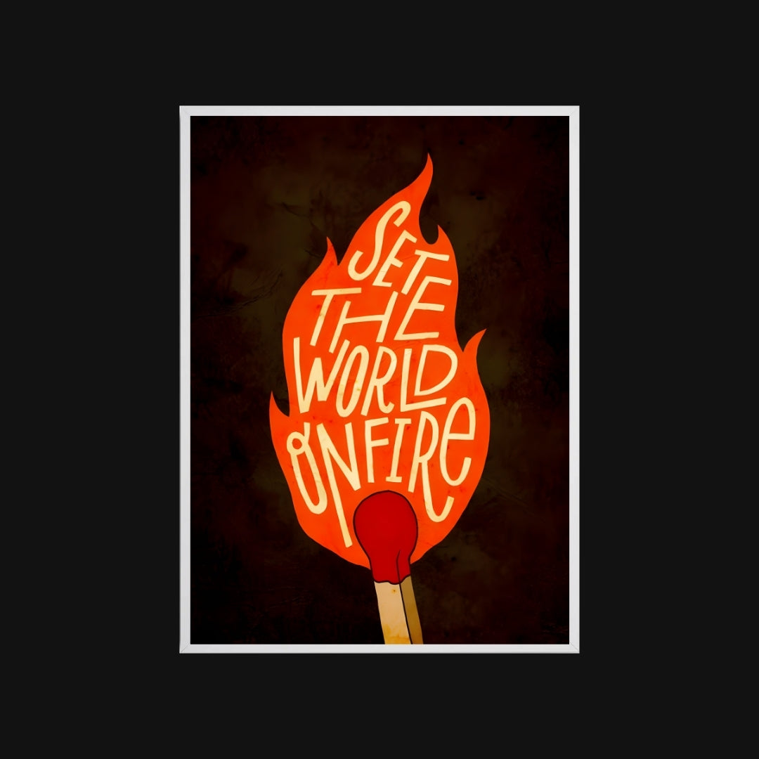 Flame-shaped sign with 'Set the World on Fire' text and a match below on a dark background