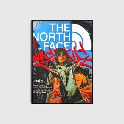 The North Face poster with a person in an orange jacket on a light gray background