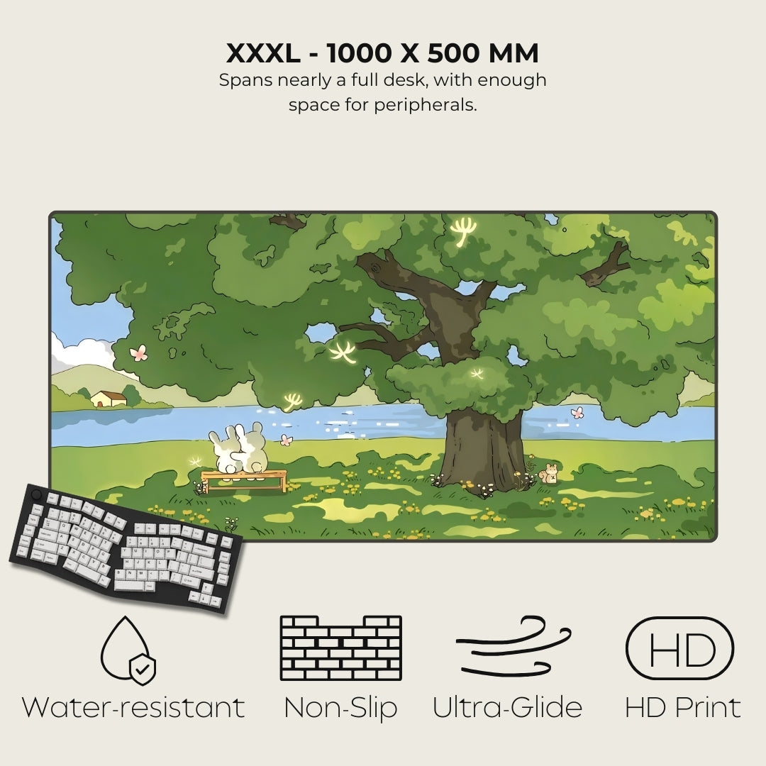Large desk mat with nature design, keyboard, and product features on a beige background