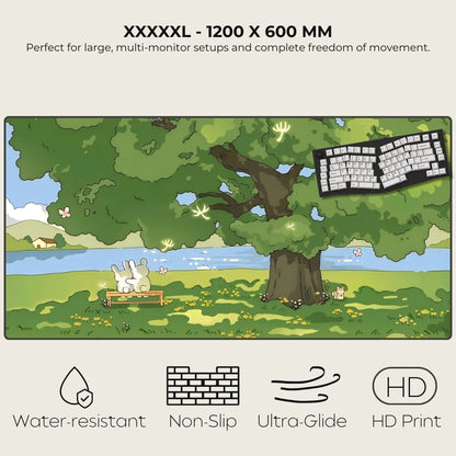 Large mouse pad with nature design, keyboard, and cartoon character under a tree.