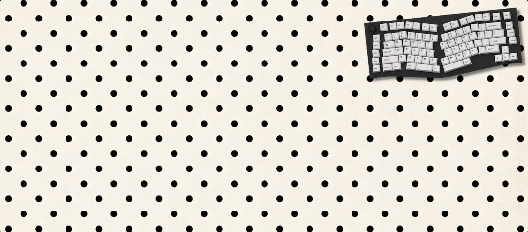 Keyboard on a pegboard with a white background